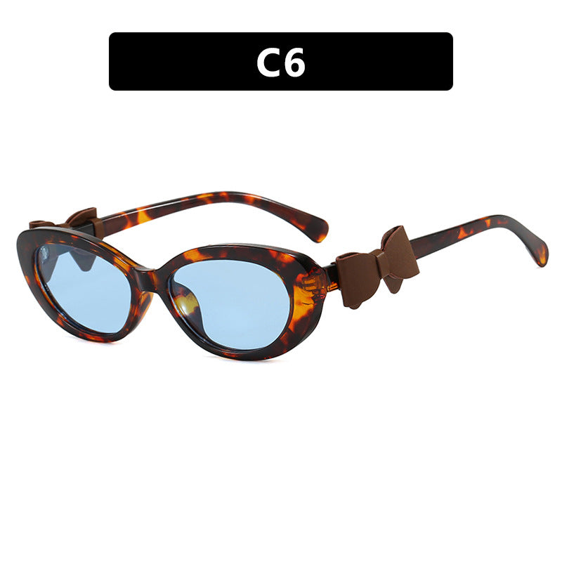 Damen modische Sonnenbrille mit verspieltem Schleifen-Design Karnz