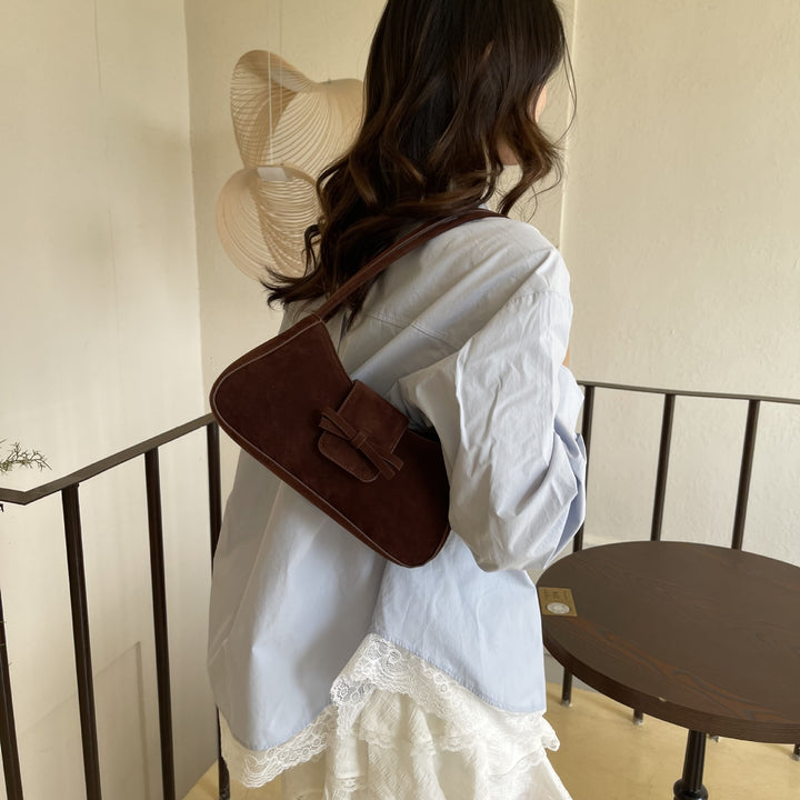 Elegante Samt-Handtasche mit Schleifendetail Karnz