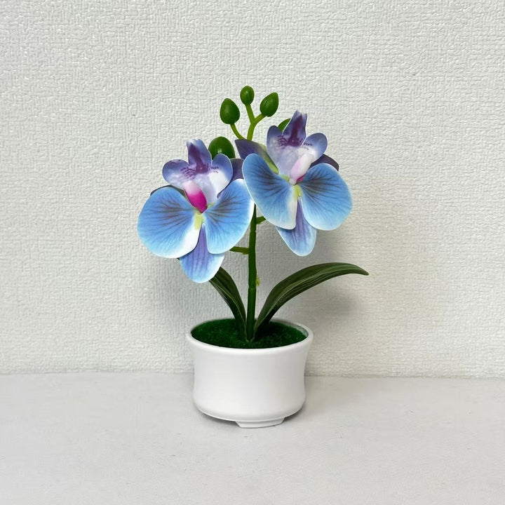 Elegante künstliche Orchideenpflanzenanordnung für die Innendekoration