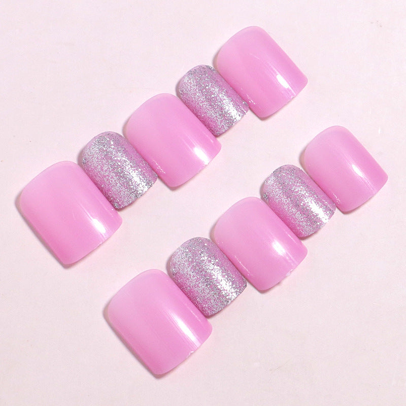 Dekoratives Press-On Nagelset mit Glitzerakzenten Karnz