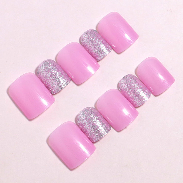Dekoratives Press-On Nagelset mit Glitzerakzenten Karnz