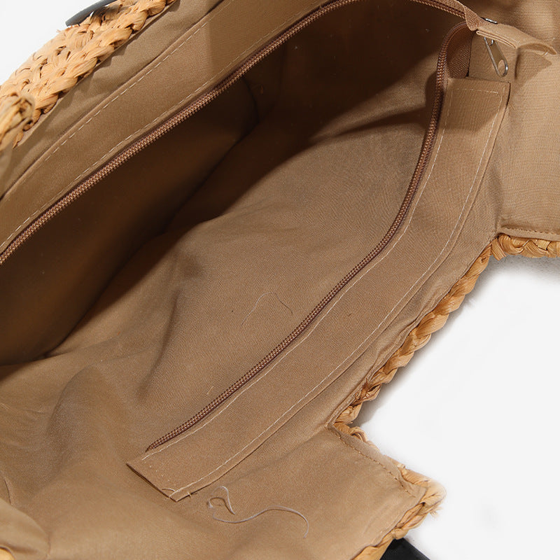 Damen Handtasche aus geflochtenem Naturmaterial mit eleganten Ledergriffen Karnz
