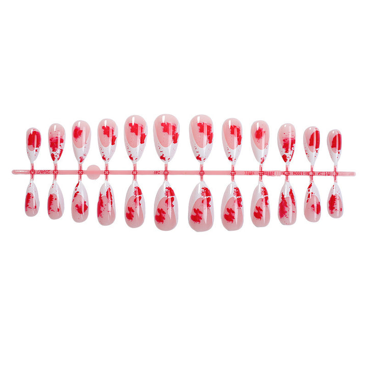 Kreatives Kunstnagelset mit floralem Design Karnz
