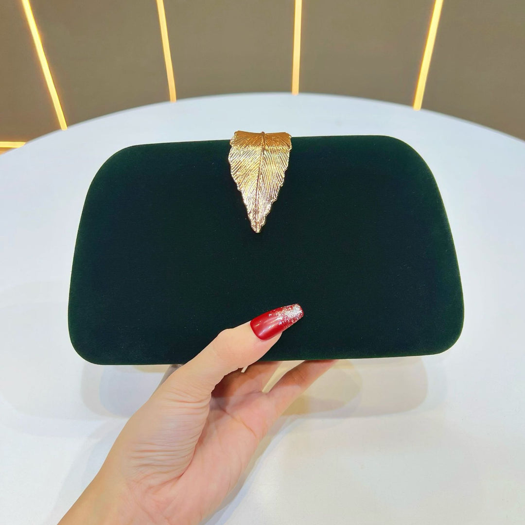 Elegante abendhandtas mit Blattakzenten