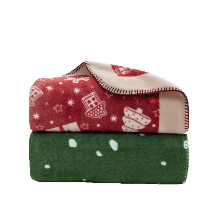 Weiche Weihnachts-Fleecedecke mit Geschenk- und Lebkuchenmotiv Karnz