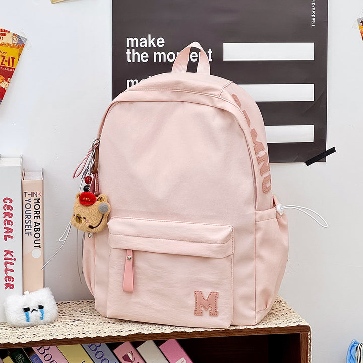 Stylischer Canvas-Rucksack mit plüschigem Schlüsselanhänger Karnz