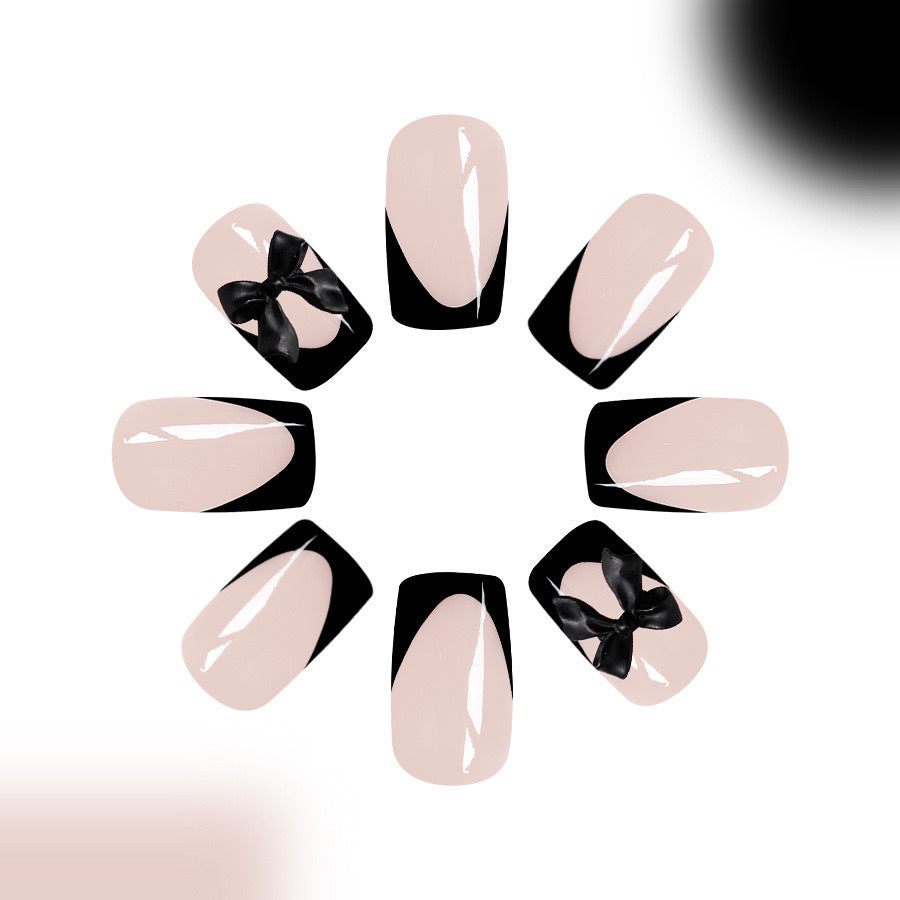 Kunstnagelset mit glamourösen Schleifenverzierungen Karnz