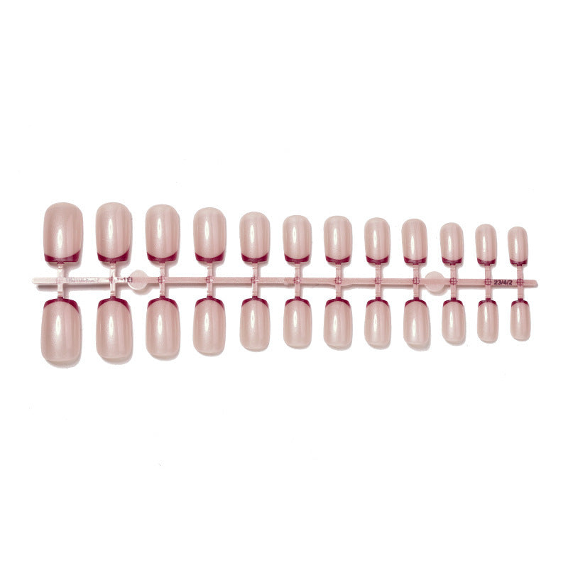Kunstnagelset mit glamourösem French-Tip-Design Karnz