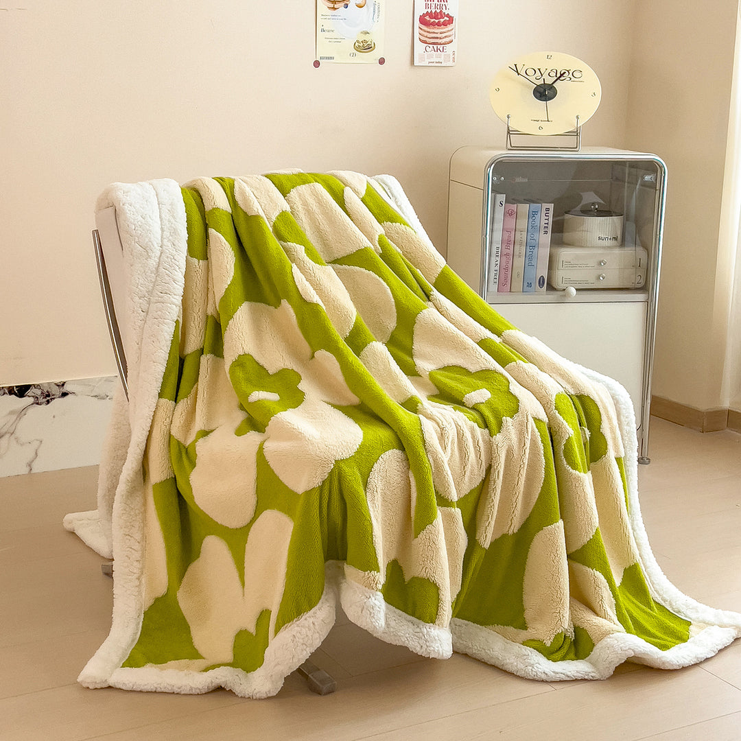 Gemütliche floral gemusterte Fleece-Decke