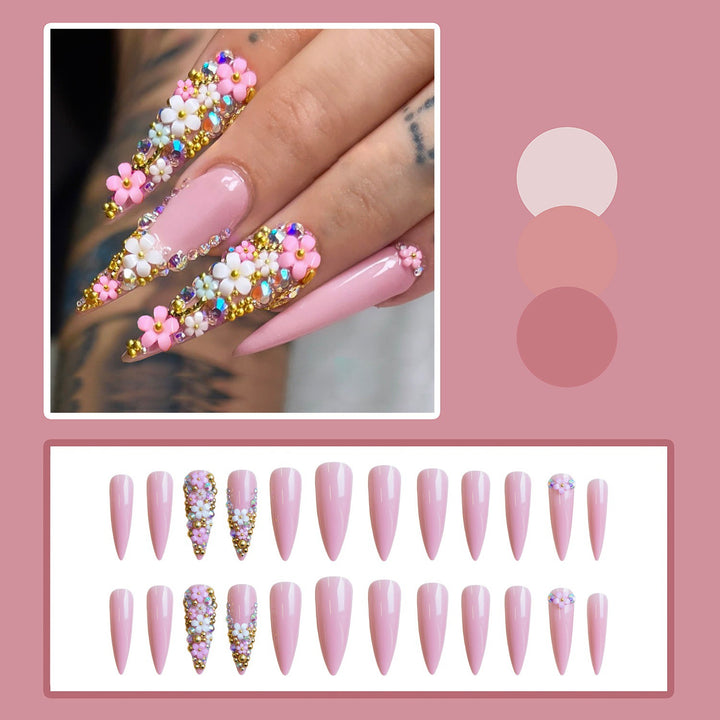 Kunstnagelset mit floralen 3D-Verzierungen und Glitzer Karnz