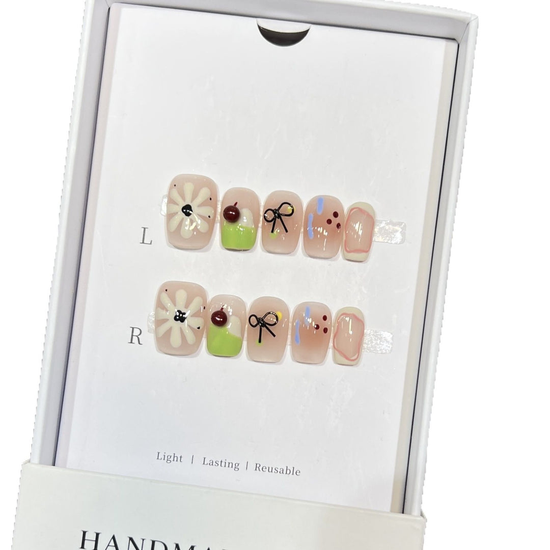 Künstlerisches Florales Press-On Nagelset mit Wiederverwendbarem Design Karnz