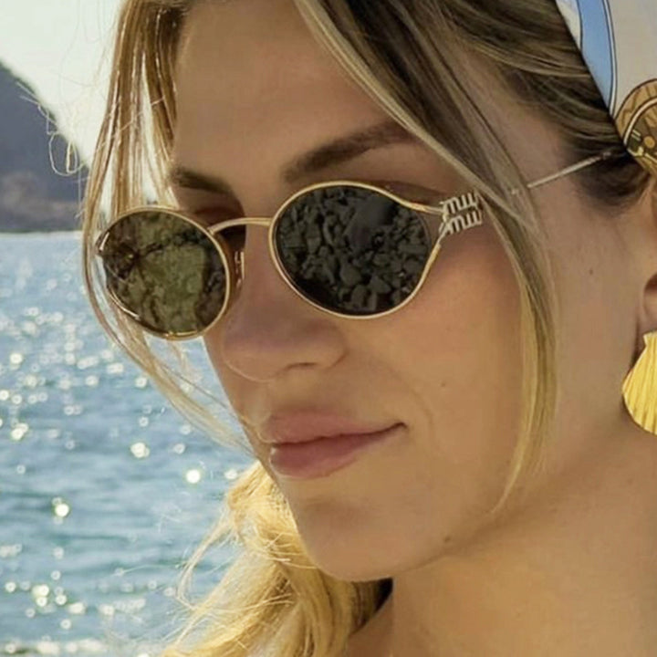 Damen Ovalförmige Sonnenbrille mit elegantem Metallrahmen und modischem Design Karnz