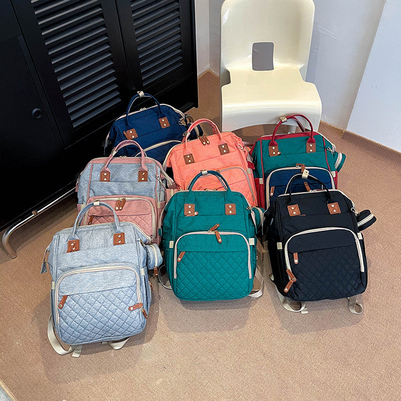 Multi-Taschen Stepp Rucksack Karnz