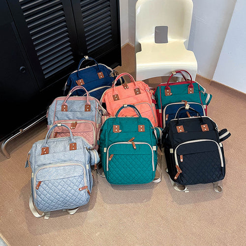 Multi-Taschen Stepp Rucksack Karnz