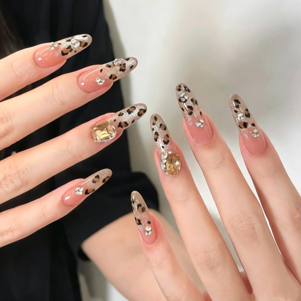 Dekorative Lange Stiletto Press-On Nägel mit Strass-Akzenten Karnz