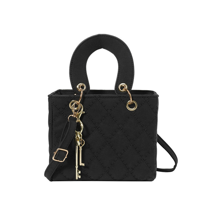Luxuriöse Metallic Stepphandtasche