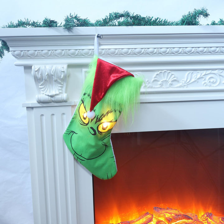Lustiger Weihnachtsstrumpf im Grinch-Design