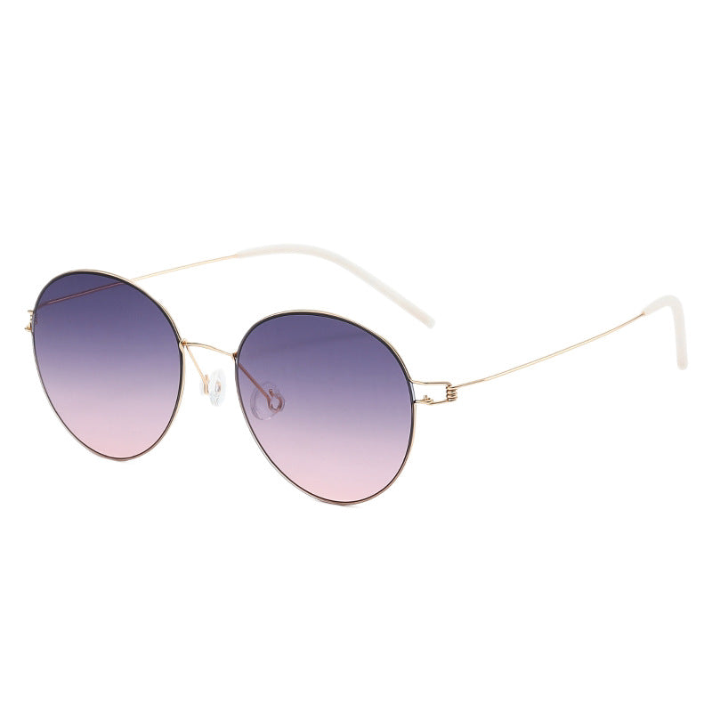 Damen runde Sonnenbrille mit leichtem Metallrahmen und gradienten Gläsern Karnz