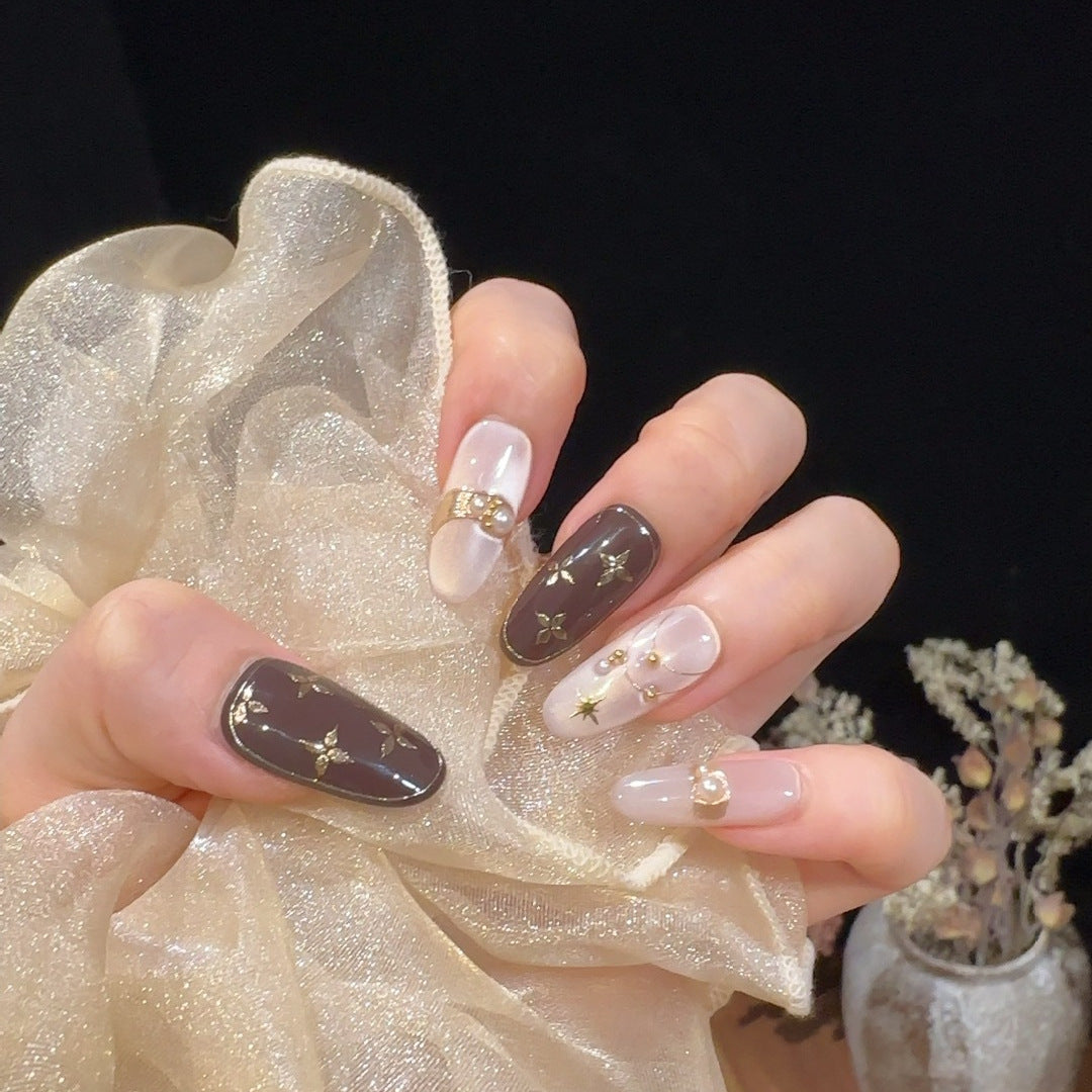 Dekorativer Press-On-Nagelset mit Sternelementen Karnz