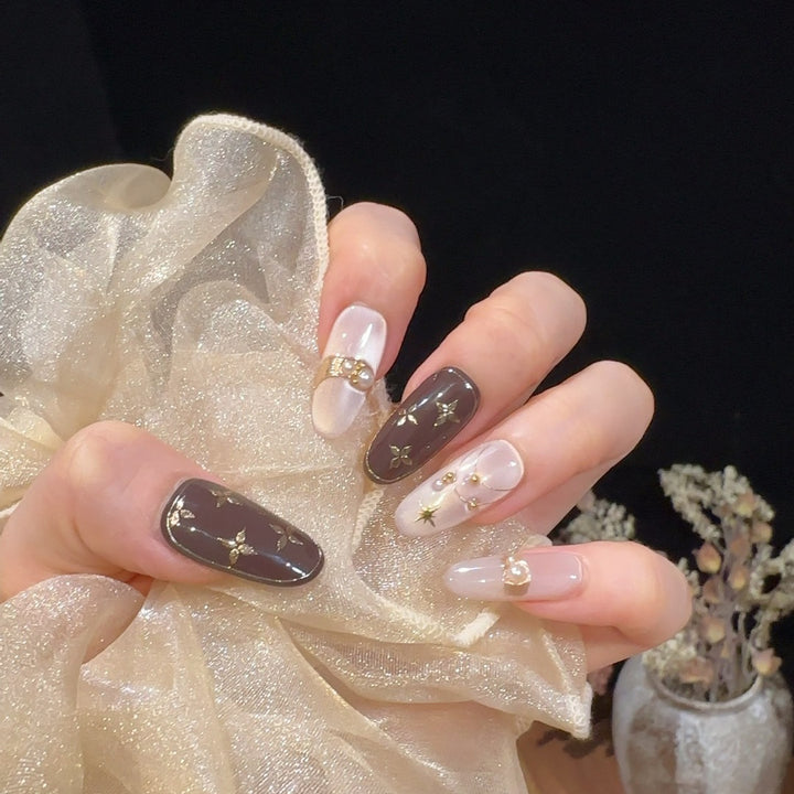 Dekorativer Press-On-Nagelset mit Sternelementen Karnz