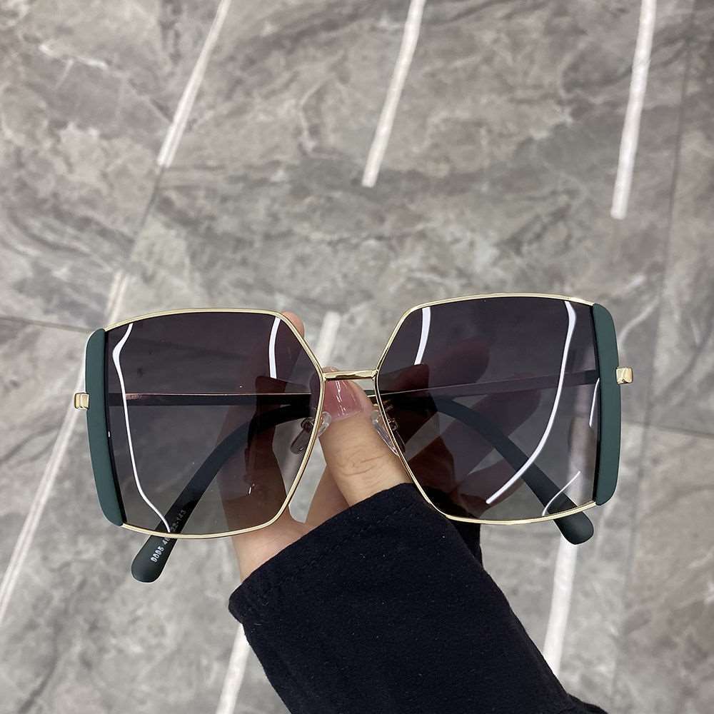 Damen oversized Sonnenbrille mit glamourösem Rahmen Karnz