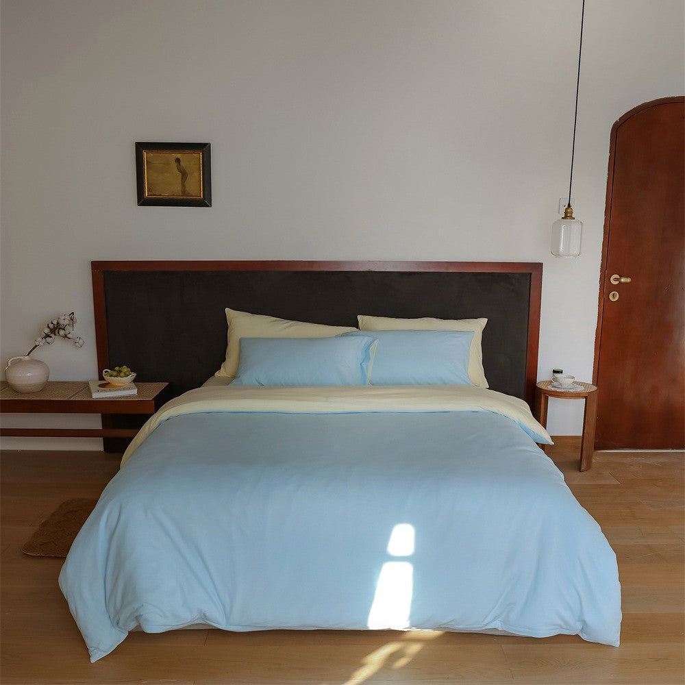 Atmungsaktives Wendebettwäsche-Set aus Bio-Baumwolle mit leichter Steppdecke und Kissenbezügen