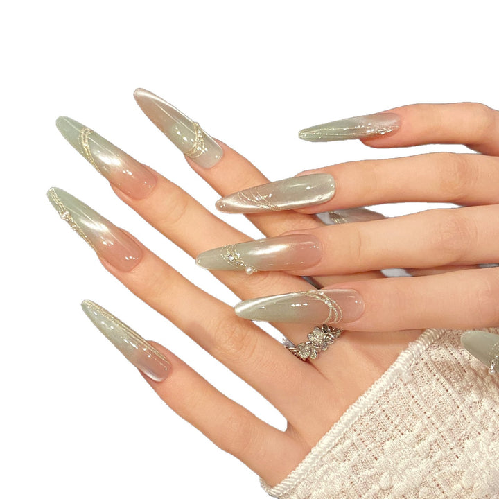 Dekorativer Press-On-Nagel-Set mit elegantem Gradient und Juwelenakzenten