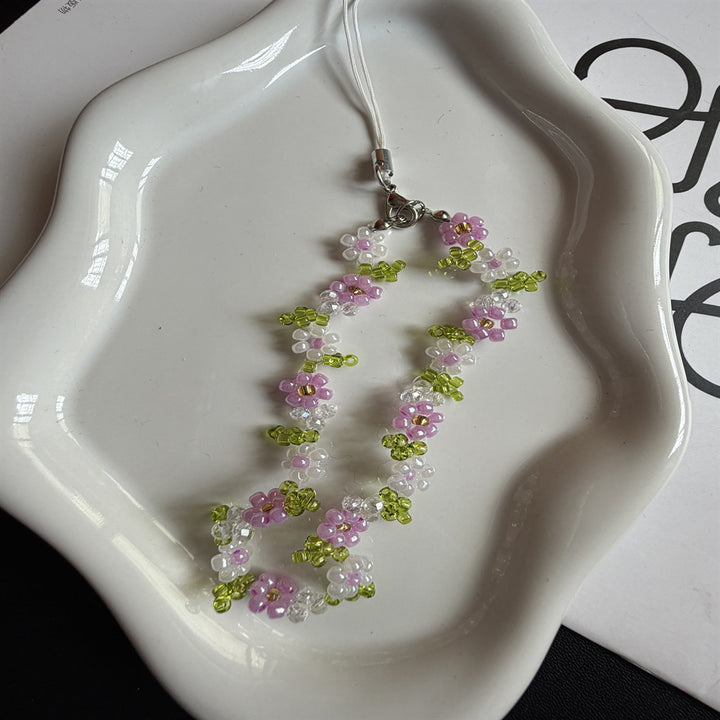 Perlenbesetzte Blumenschmuckkette Karnz