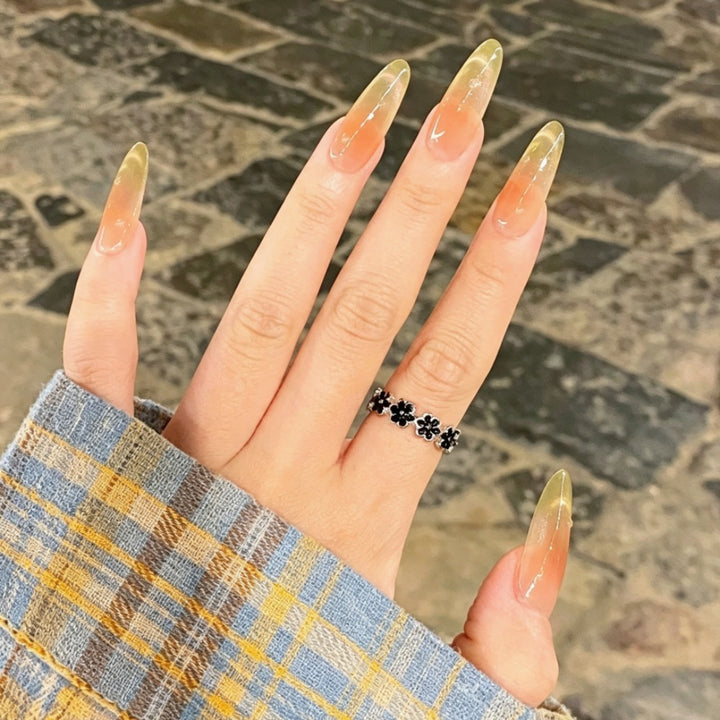 Stilvolle lange Stiletto Press-On Nägel Karnz