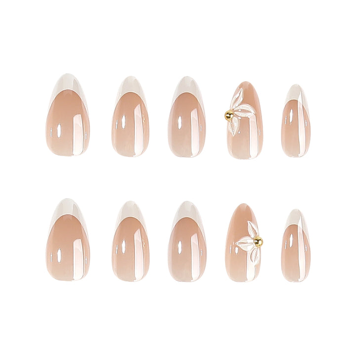 Kunstvolle Stiletto-Nägel mit elegantem Blumendesign Karnz