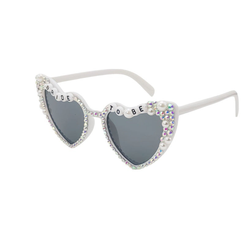 Damen Herzförmige Sonnenbrille mit außergewöhnlichem Dekor Karnz