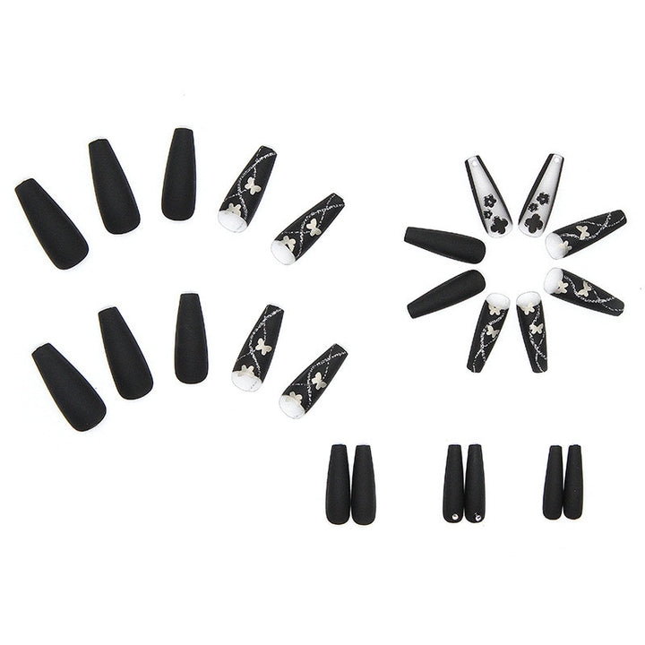 Kunstnagelset mit eleganten Schmetterlings- und Blumenmotiven Karnz