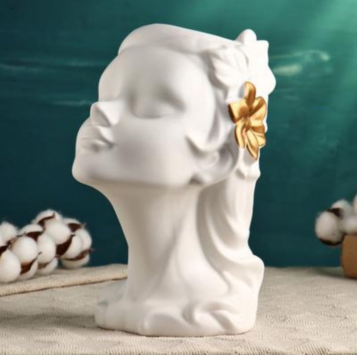 Kunstvolle Pflanzenskulpturen Karnz