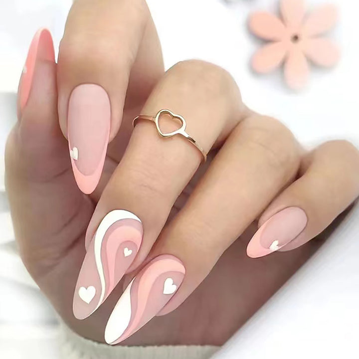 Elegante Stiletto Press-On Nägel mit Herz- und Wellenmuster Karnz