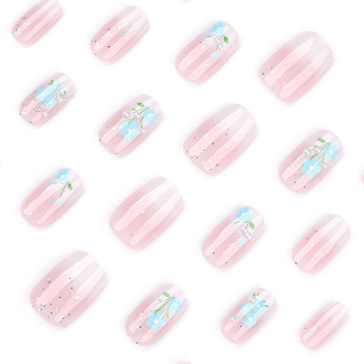 Kunstvolle Nagelverlängerungen mit blumigem Design Karnz