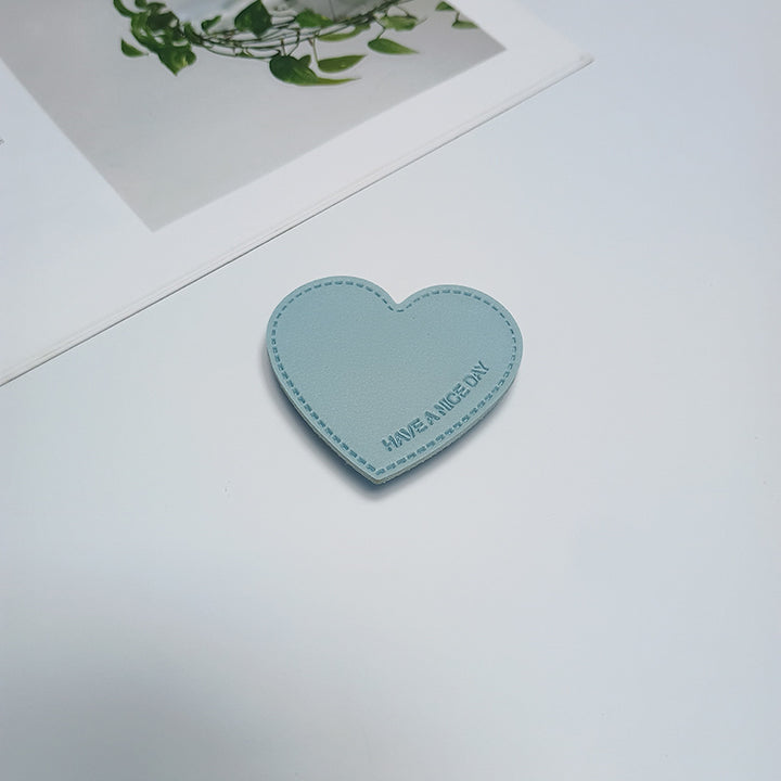 Herzförmiger Telefonhalter Karnz