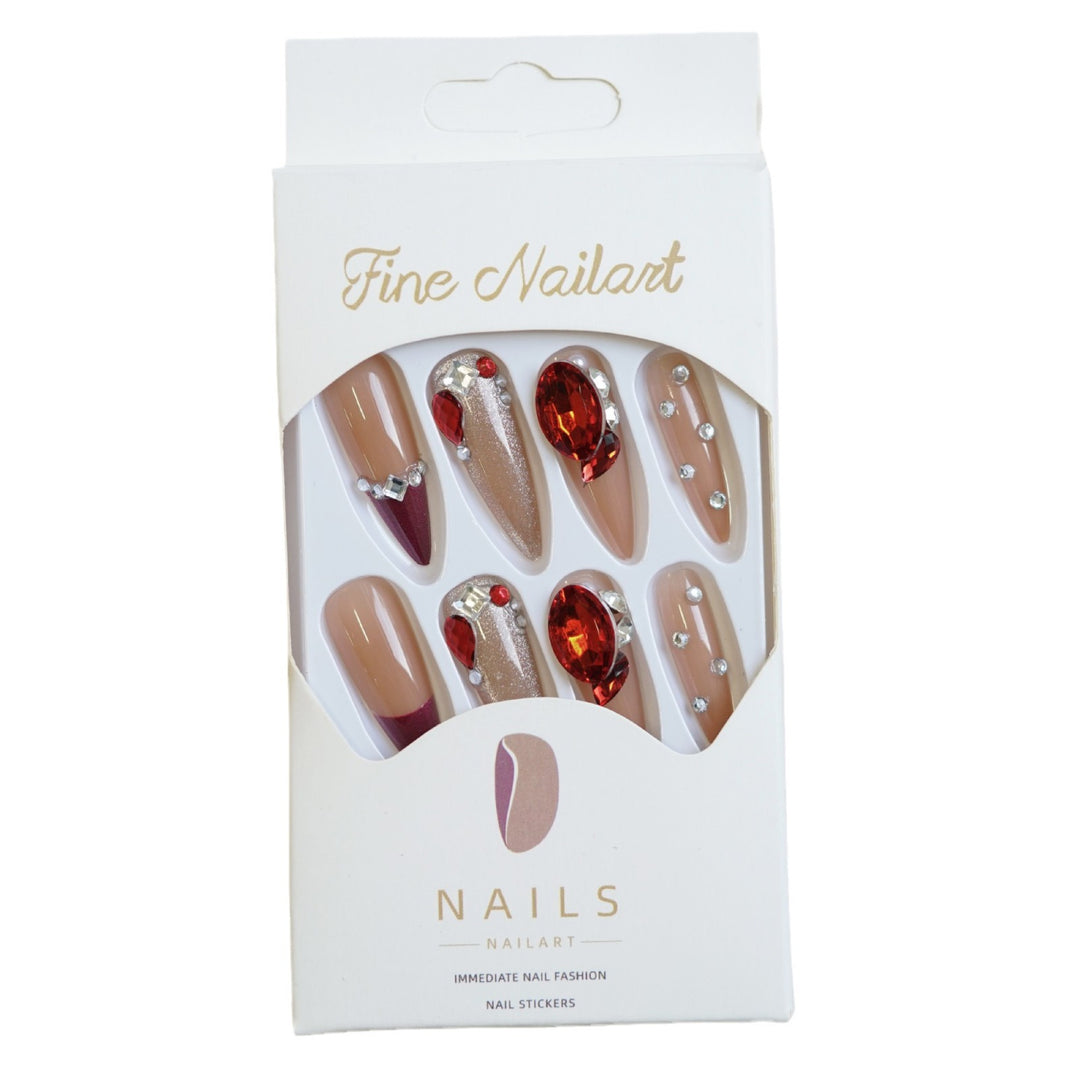 Dekoratives Stiletto Press-On Nagelset mit Strassakzenten