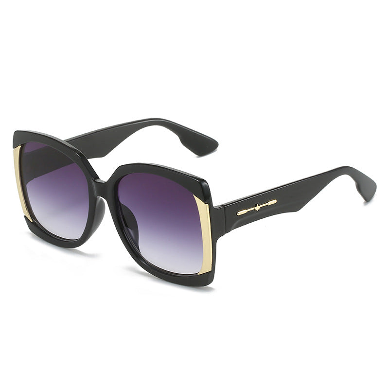Übergroße Schildpatt-Sonnenbrille mit goldenen Akzenten Karnz