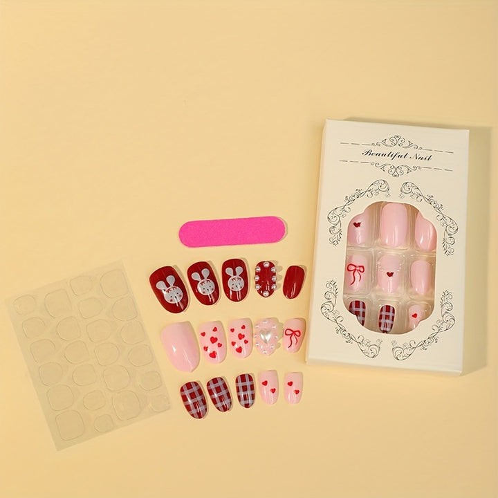 Kreatives Kunstnagelset mit niedlichen Hasen- und Herzen-Motiven Karnz