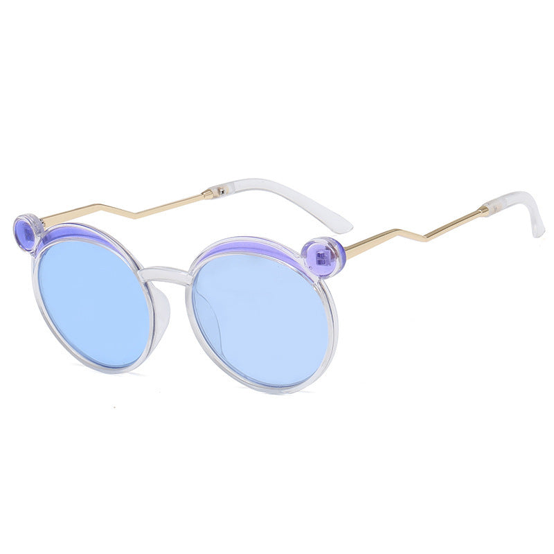 Damen Fashion-Runde Sonnenbrille mit innovativem Rahmen und farbigen Gläsern Karnz