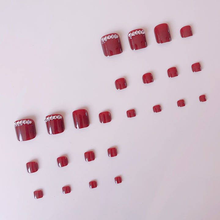 Kunstnagelset mit eleganter Nagelkunst und Funkelelementen Karnz