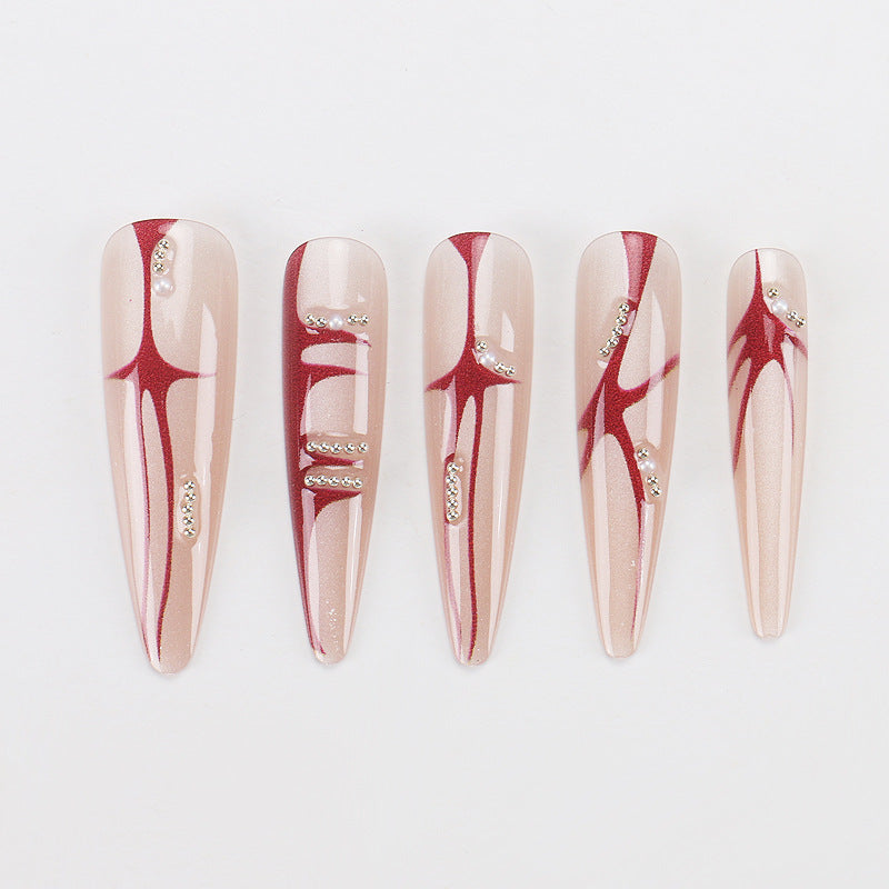Künstlerische Stiletto Press-On-Nägel mit einzigartigem abstraktem Design Karnz