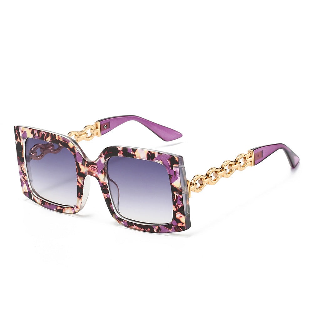 Damen elegante Sonnenbrille mit luxuriösen Kettendetails Karnz