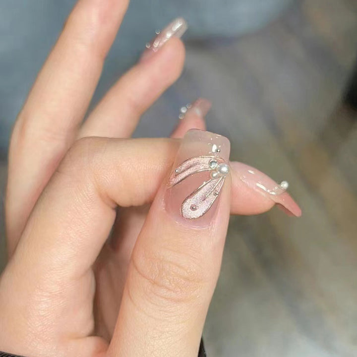 Dekorativer Press-On-Nagelset mit Perlenakzenten Karnz