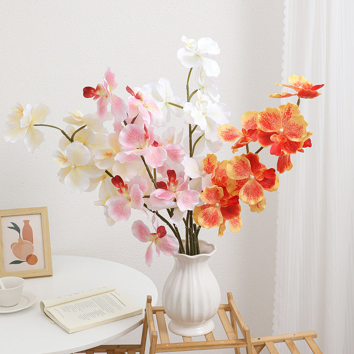 Künstlicher Orchideenstrauß mit realistischen Details Karnz