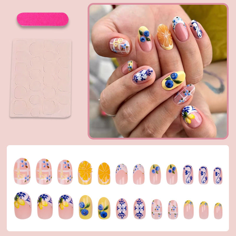 Kunstnagelset mit eleganten Obst- und Blumenmustern Karnz