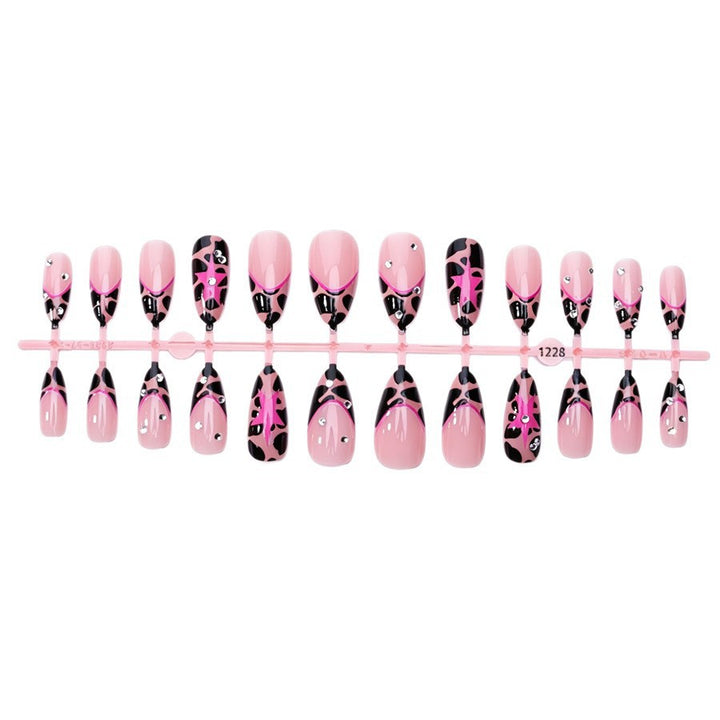 Kunstnagelset mit glamourösen Leoparden-Design und Glitzerelementen Karnz