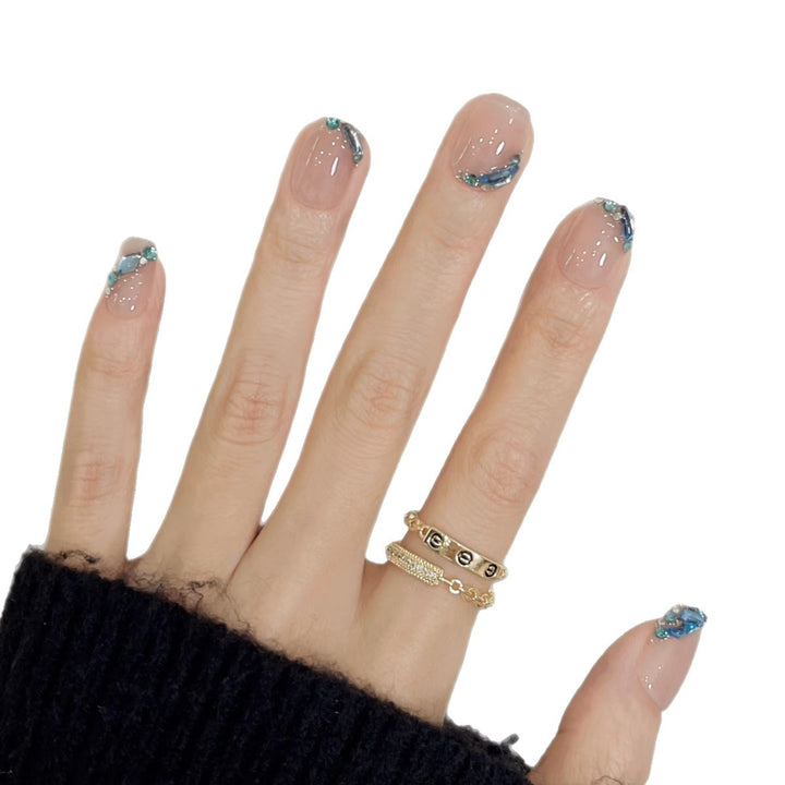Elegantes Press-On Nagelkunstset mit dekorativen Wellenmustern