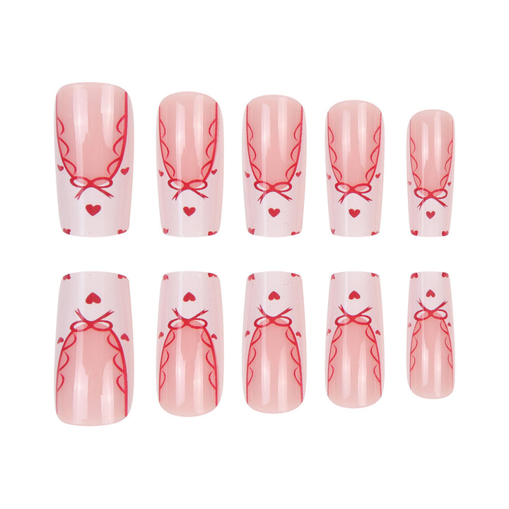 Dekoratives Langes Press-On-Nagelset mit Schleifen- und Herzdesign Karnz