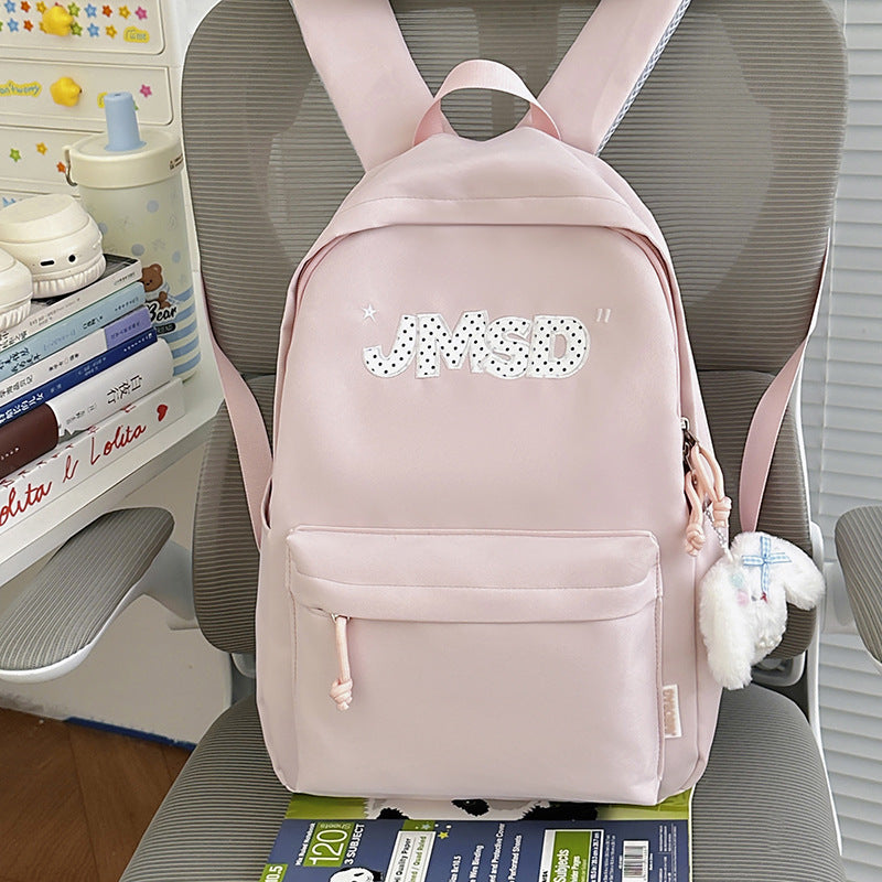 Trendy lässiger Tagesrucksack mit süßem Charakterakzent Karnz